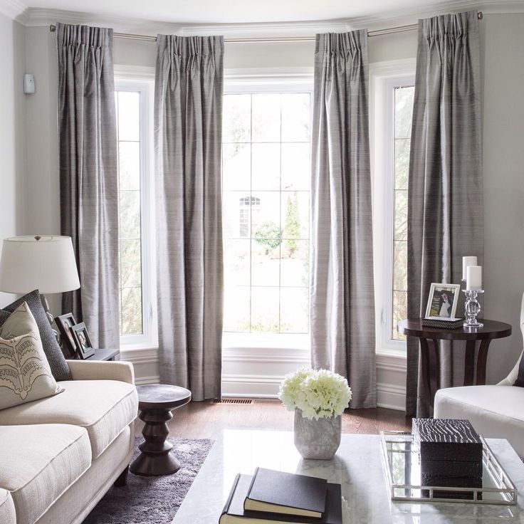 Amazing u201cLovely bay window treatment. Off center window can still work in a bay window curtains for living room