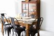 Awesome Matte black chairs with a rustic, wooden table from Pineapple Life (via black wood dining room chairs