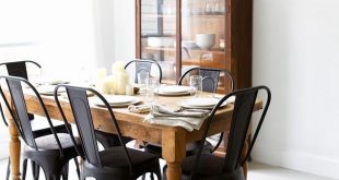 Awesome Matte black chairs with a rustic, wooden table from Pineapple Life (via black wood dining room chairs