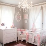 Cozy Nursery chandelier · 10 Most Viewed Nurseries in 2014 from  ProjectNursery.com baby girl room decor ideas