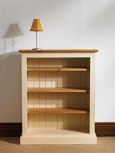 Beautiful Paint and stain wooden bookshelf, light color for a small condo, but still small wooden bookshelf