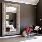 Cute This is absolutely stunning! the mirror, the flowers, the dark wall against bedroom wall mirrors