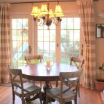Best sliding glass door curtain ideas...love the country chairs and the curtains! curtains for sliding glass door