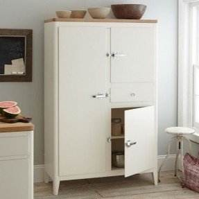 Chic Inspired by 1960s country lodge living, the Cabin Kitchen Armoire white armoire with drawers