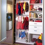 Chic White laminate kids closet with shelves, drawers and hanging space. bedroom storage furniture