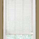 Chic white wooden blinds size 30 W and 54 H.....atleast two white wooden blinds