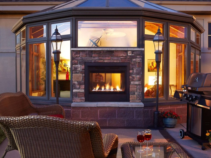 Compact New Heat u0026 Glo Indoor Outdoor fireplace with safe exterior glass. indoor outdoor fireplace