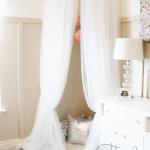 Compact Whimsical Canopy Tent or Reading Nook made from curved curtain rod and $4 curved curtain rod for corner