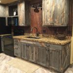 Contemporary A little barnwood kitchen cabinets and corrugated steel backsplash. Love  how rustic wood kitchen cabinets