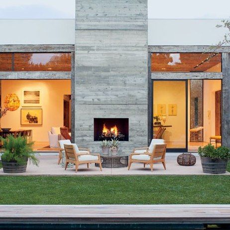 Contemporary Fashion Designer Jenni Kayneu0027s 1980s Residence in Beverly Hills. Modern Outdoor indoor outdoor fireplace