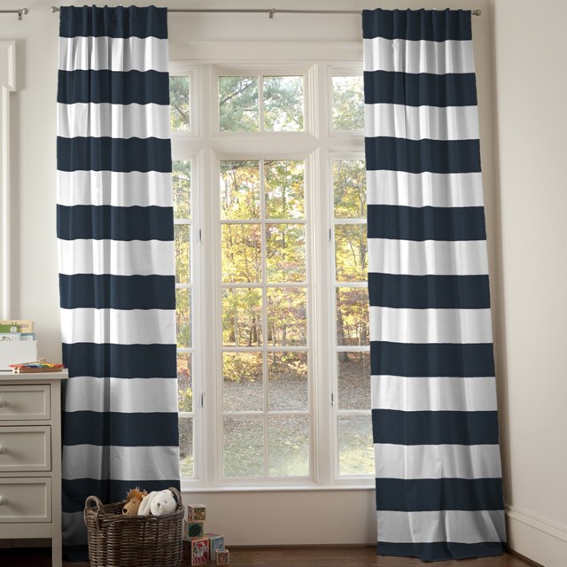 Create a romantic ambience to your room with blue and white curtains