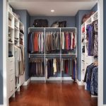 Cozy Custom Walk-In Closet Organizers: White traditional-closet walk in closet organizers