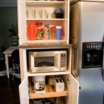 Cute appliance garage (put shelves higher) Top shelf: Microwave u0026 Toaster Oven. microwave storage shelf