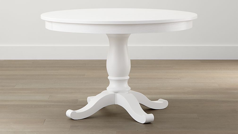 Bring out the classic theme for your dining room by using the white dining table