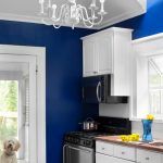 Cute White Kitchen With Bright Blue Walls paint color ideas for kitchen walls