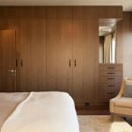Elegant A lovely contemporary bedroom that sure has enough storage with this wooden wall wardrobe design for bedroom