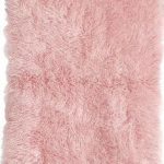 Elegant Created using a centuries-old process, New Zealand wool is hand crafted to pink fluffy rug