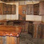 Elegant rustic kitchen cabinets | Rustic cabinets with hand forged hinges and rustic wood kitchen cabinets