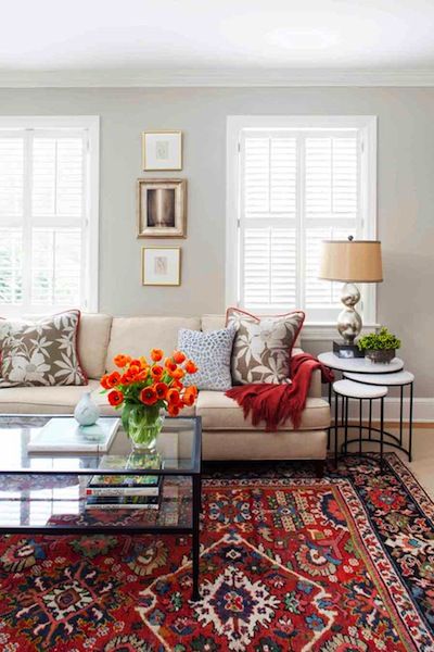 Elegant Transitional living room with oriental rug, custom textiles and nesting  tables. persian rug living room