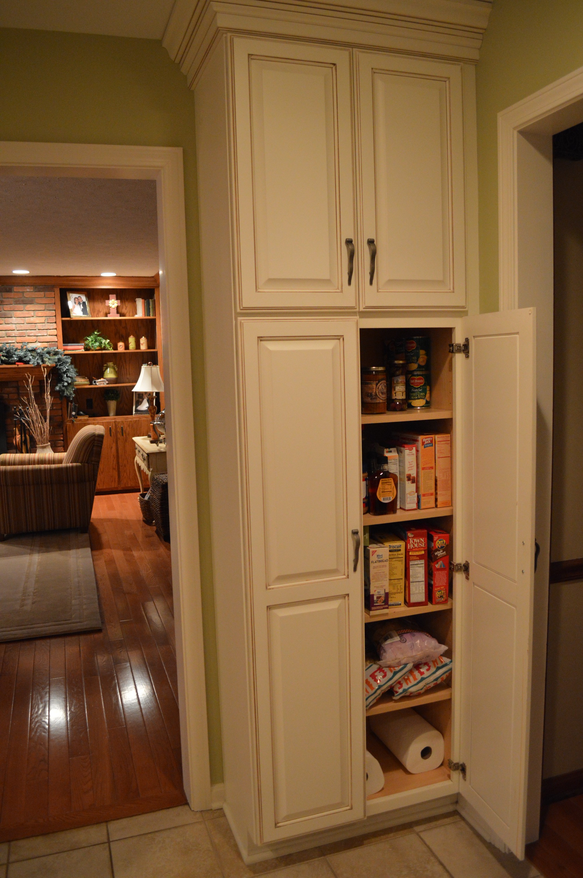 Elegant White Wooden Tall Narrow Pantry Cabinet With 4 Maple Wood Shelves And pantry cabinets with doors