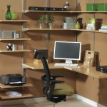 Master Versatile adjustable shelving is key to organizing this home office,  featuring the wall mounted adjustable shelving