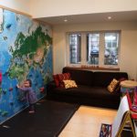Modern View in gallery A climbing wall with right protection is a great kids playroom ideas
