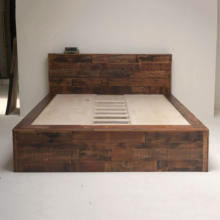 Photos of Amazing bed made of salvaged wood. dark wood bed frame