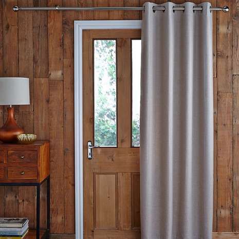 Photos of Featuring an eyelet header, this natural-coloured door curtain is fully  thermal lined thermal door curtain with eyelet heading