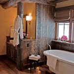 Simple Rustic Bathroom With Wood Ceiling and Walls Plus Soaking Tub rustic country bathroom decor
