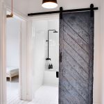 Best ... Reused old barn door creates a fabulous entrance for the Scandinavian sliding doors for bathroom entrance