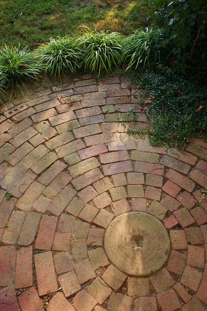 Stunning Circular brick patio- the casual and informal design is appealing. round brick patio designs