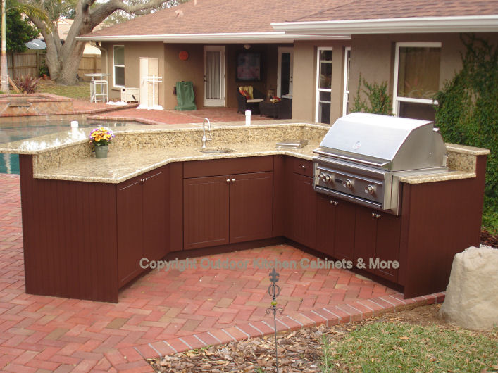 Stunning Outdoor Kitchen Exposed To The Elements weatherproof cabinets for outdoor kitchen