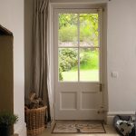 Cute Warm up your entrance hall with fabric draped across the door. Pale thermal front door curtain