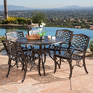 Trending Hallandale Sarasota Cast Aluminum Bronze 5-piece Outdoor Dining Set by  Christopher Knight patio table and chairs set