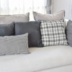 Unique White sofa with charcoal grey and white throw pillows in a variety white sofa pillows