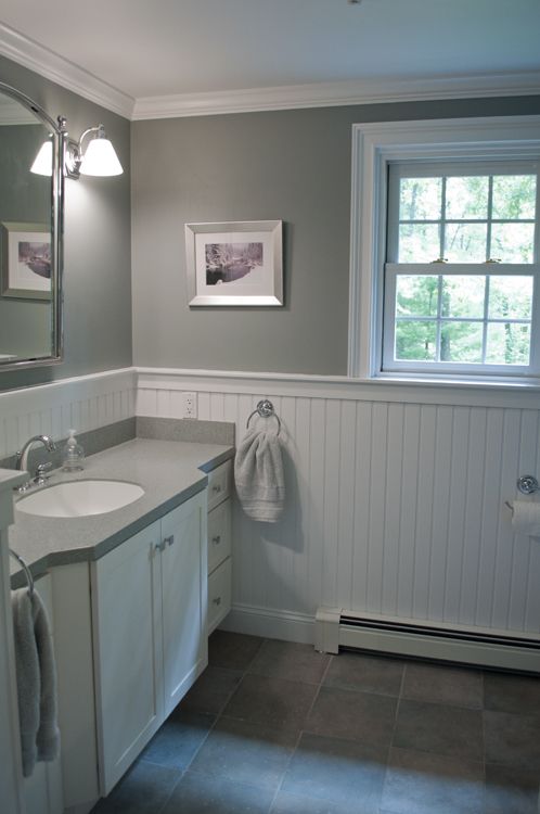 Unique New England bathroom design. Custom by PNB. Porcelain stone look tile, white white beadboard bathroom
