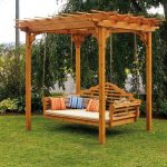 Luxury Garden swing under a small wooden pergola near trees wooden garden swings for adults