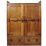 a large arts u0026 crafts oak wardrobe with stylised iron hinges IOWNSAZ