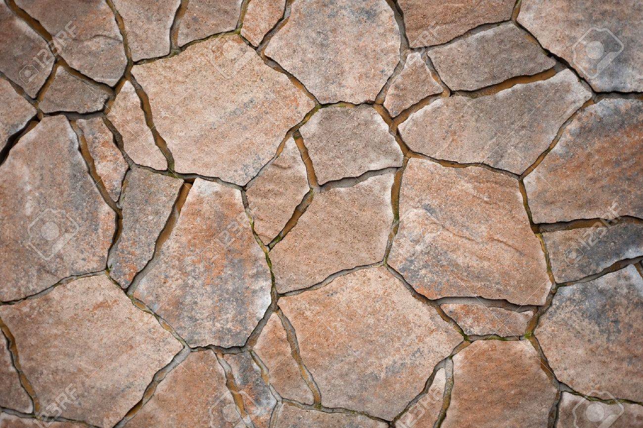 background from paving stones, irregular natural stones stock photo - CULYICD