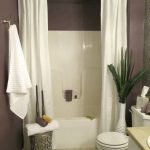 bathroom shower curtains hang a second shower curtain to make your tub seem extra AHSJXHU