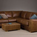 broad arm leather corner sofa with a footstool TGZXHQU