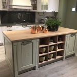 french country kitchen island and open storge space VTMCITE