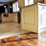 kitchen flooring with tiles #kitchen idea of the day: perfectly smooth transition from hardwood flooring SMRVLAZ