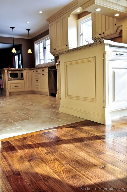 kitchen flooring with tiles #kitchen idea of the day: perfectly smooth transition from hardwood flooring SMRVLAZ