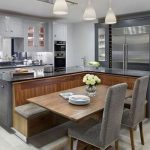 kitchen island with seating beautiful kitchen with black and wood design IXAVIUD