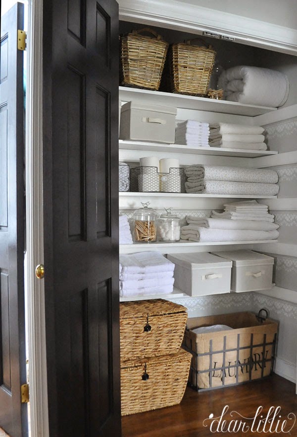 linen closets with a mix of towel and bedding storage, this beautifully organized YCQDKWC