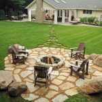 stone patio ideas stepping stones out to the fire pit in the far corner GFUWANN