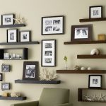 wall decoration ideas install wooden shelves and family framed photos as brilliant wall decor QNCNMNW