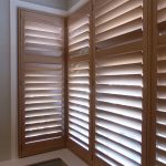 wooden shutters square bay window with natural wood shutters fitted UMQXLEJ