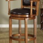 Sturdy wooden bar stool with arms and upholstered back and seat.